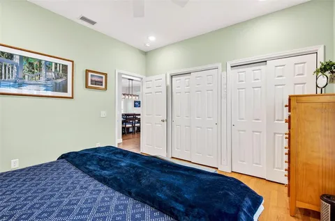 a view of staircase with wooden floor and stairs