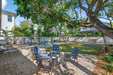 an aerial view of a house with a garden