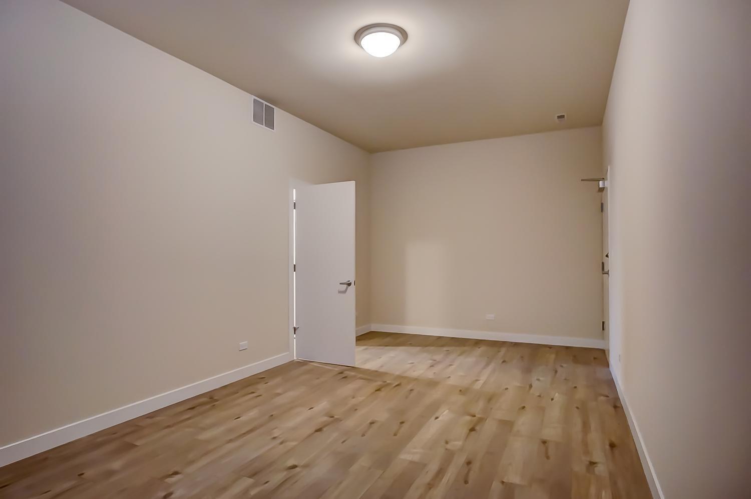 2532 West Addison Street, Unit 1W Chicago, IL 60618 - Photo 20 of 24 a view of an empty room