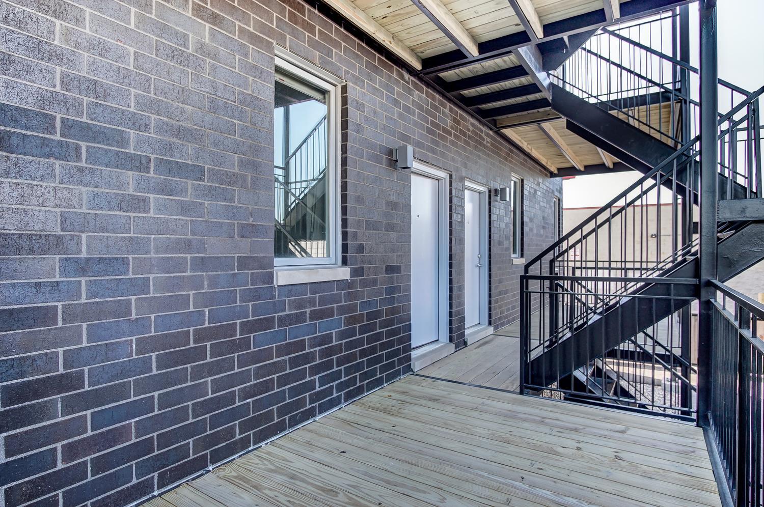 2532 West Addison Street, Unit 1W Chicago, IL 60618 - Photo 22 of 24 a view of outdoor space with wooden floor and window