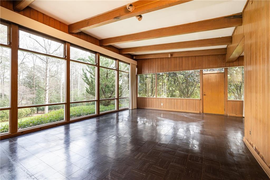 3248 Nancy Creek Road Northwest Atlanta, GA 30327 - Photo 17 of 44 a view of empty room with wooden floor and fan