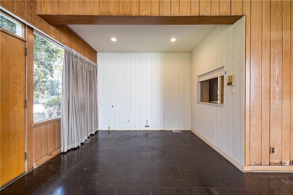 3248 Nancy Creek Road Northwest Atlanta, GA 30327 - Photo 19 of 44 an empty room with wooden floor and windows