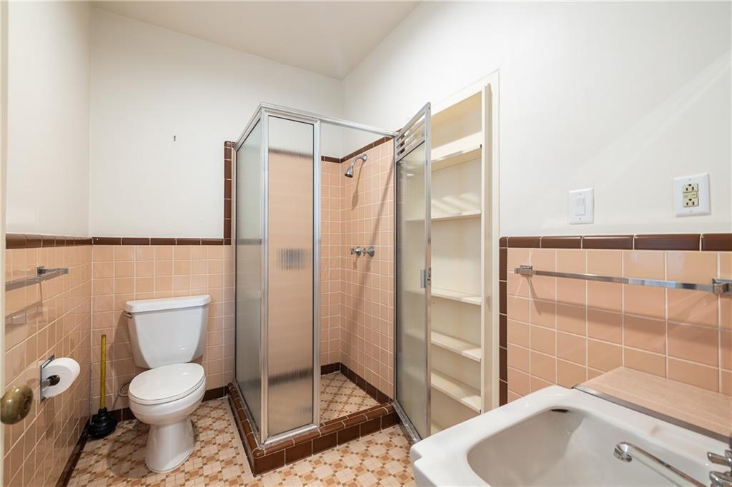 3248 Nancy Creek Road Northwest Atlanta, GA 30327 - Photo 30 of 44 a bathroom with a toilet and a shower