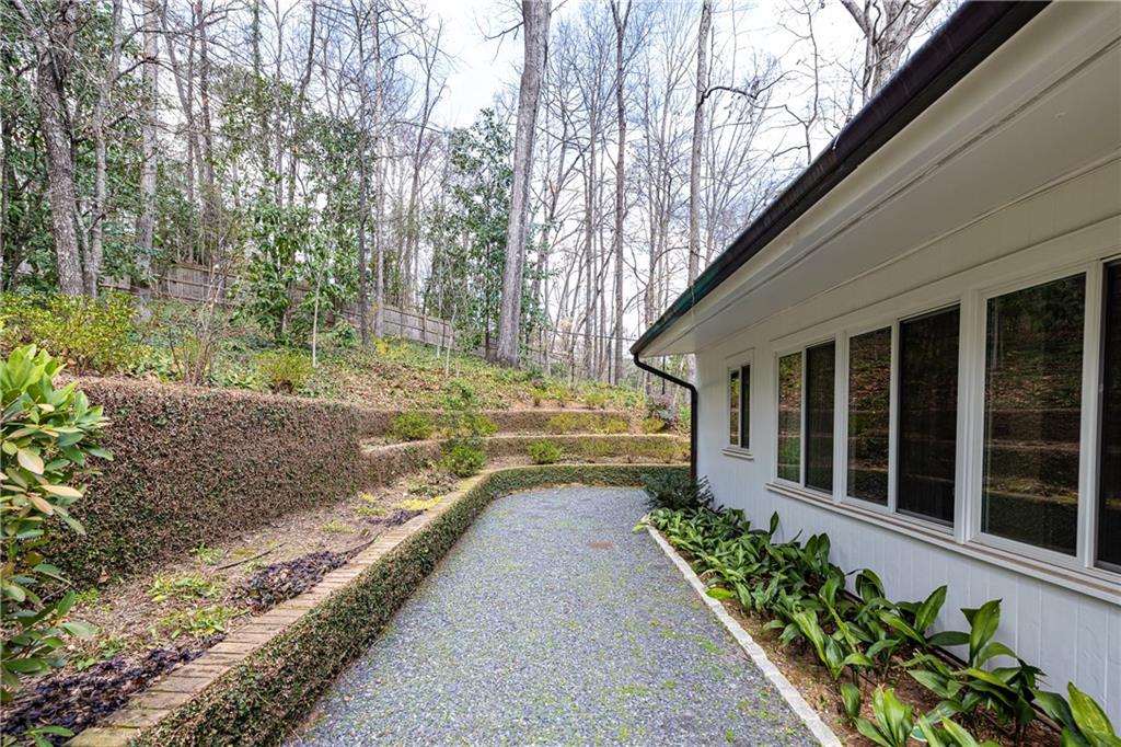 3248 Nancy Creek Road Northwest Atlanta, GA 30327 - Photo 41 of 44 a view of a house with a yard and pathway