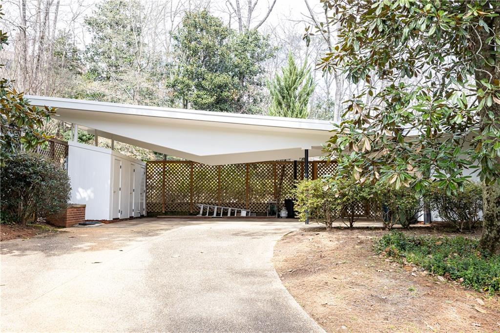 3248 Nancy Creek Road Northwest Atlanta, GA 30327 - Photo 44 of 44 a front view of house with yard and trees in the background