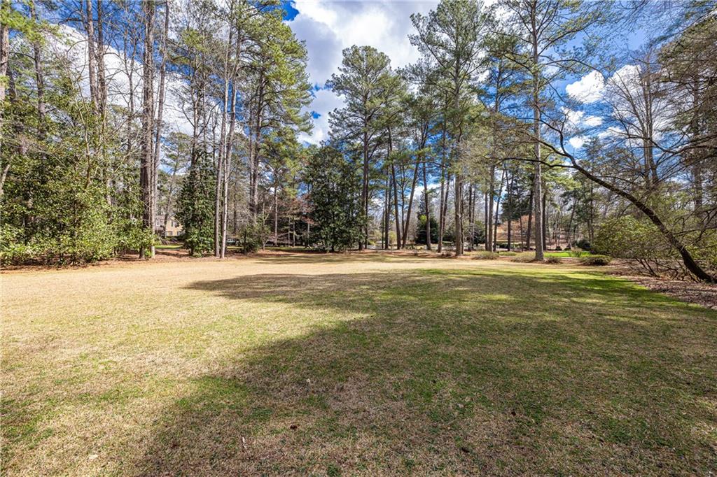 3248 Nancy Creek Road Northwest Atlanta, GA 30327 - Photo 6 of 44 a view of pool and trees