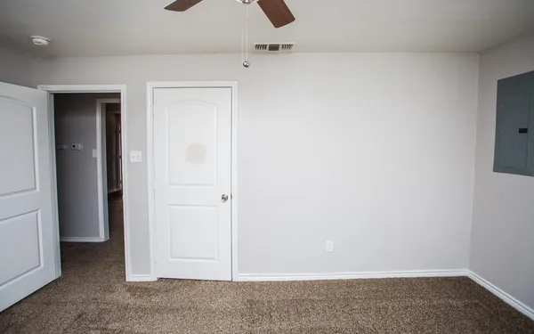 an empty room with closet