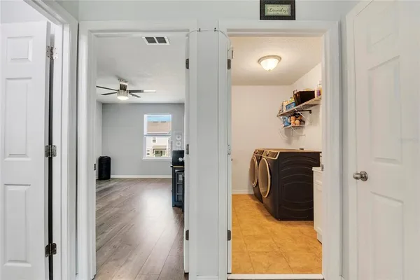 a view of a livingroom with wooden floor
