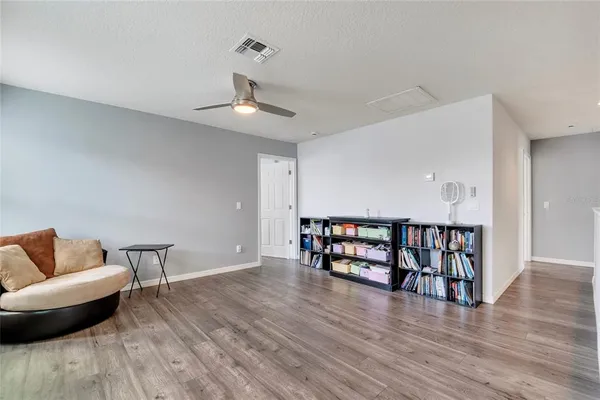 a view of livingroom with furniture and wooden floor