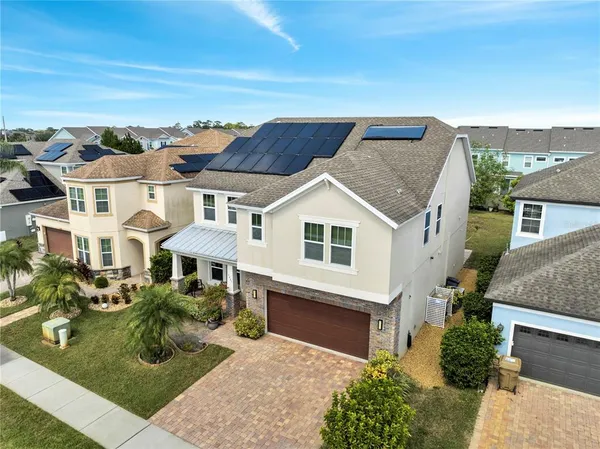 front view of a house with a garden