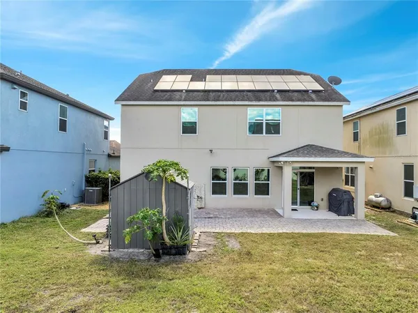 a view of a house with swimming pool