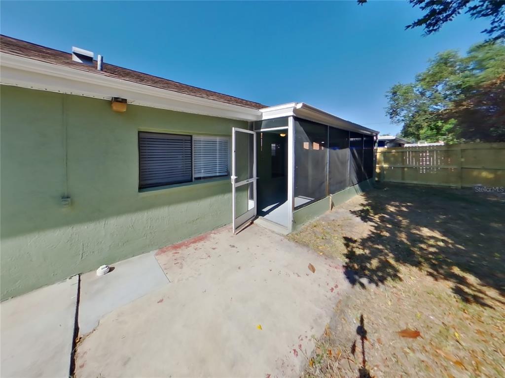 Undisclosed Address Holiday, FL 34691 - Photo 17 of 18 a front view of a house with a yard
