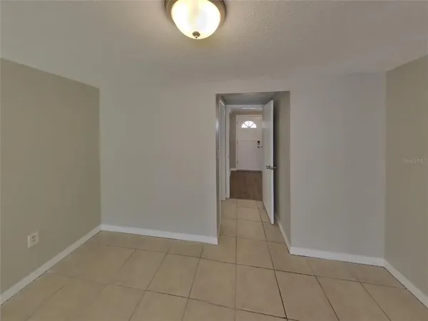 a view of a livingroom and a bathroom