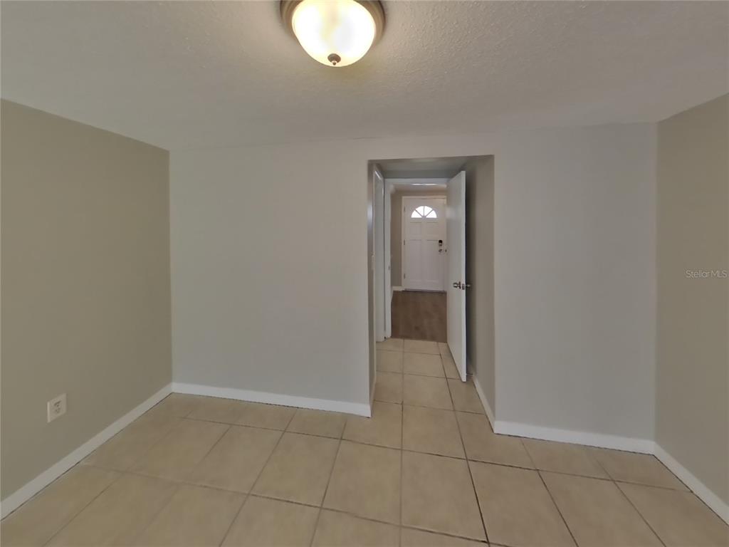 Undisclosed Address Holiday, FL 34691 - Photo 6 of 18 a view of a livingroom and a bathroom