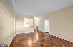 a view of an empty room and window