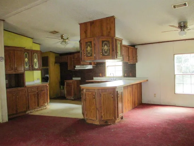 a view of a room that has a window