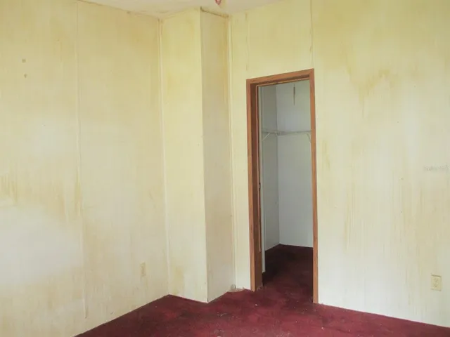 a bathroom with a shower and a sink