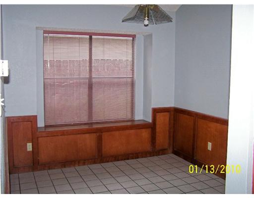 2605 Bevecrest Street Corpus Christi, TX 78415 - Photo 4 of 10 a view of a door and wooden cabinets