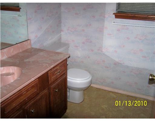 2605 Bevecrest Street Corpus Christi, TX 78415 - Photo 9 of 10 a bathroom with a sink and a toilet