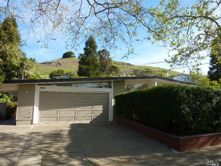 666 Las Colindas Road San Rafael, CA 94903 - Photo 1 of 1 a front view of a house with a yard