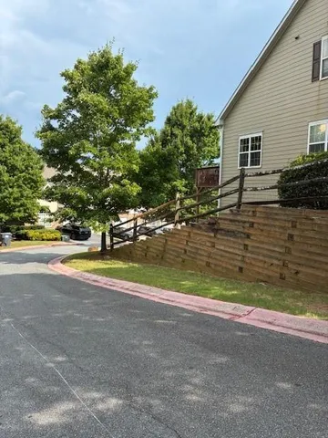 a view of fountain in front of house