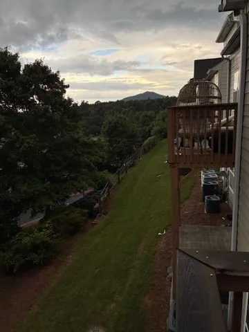 a view of a balcony with an outdoor space