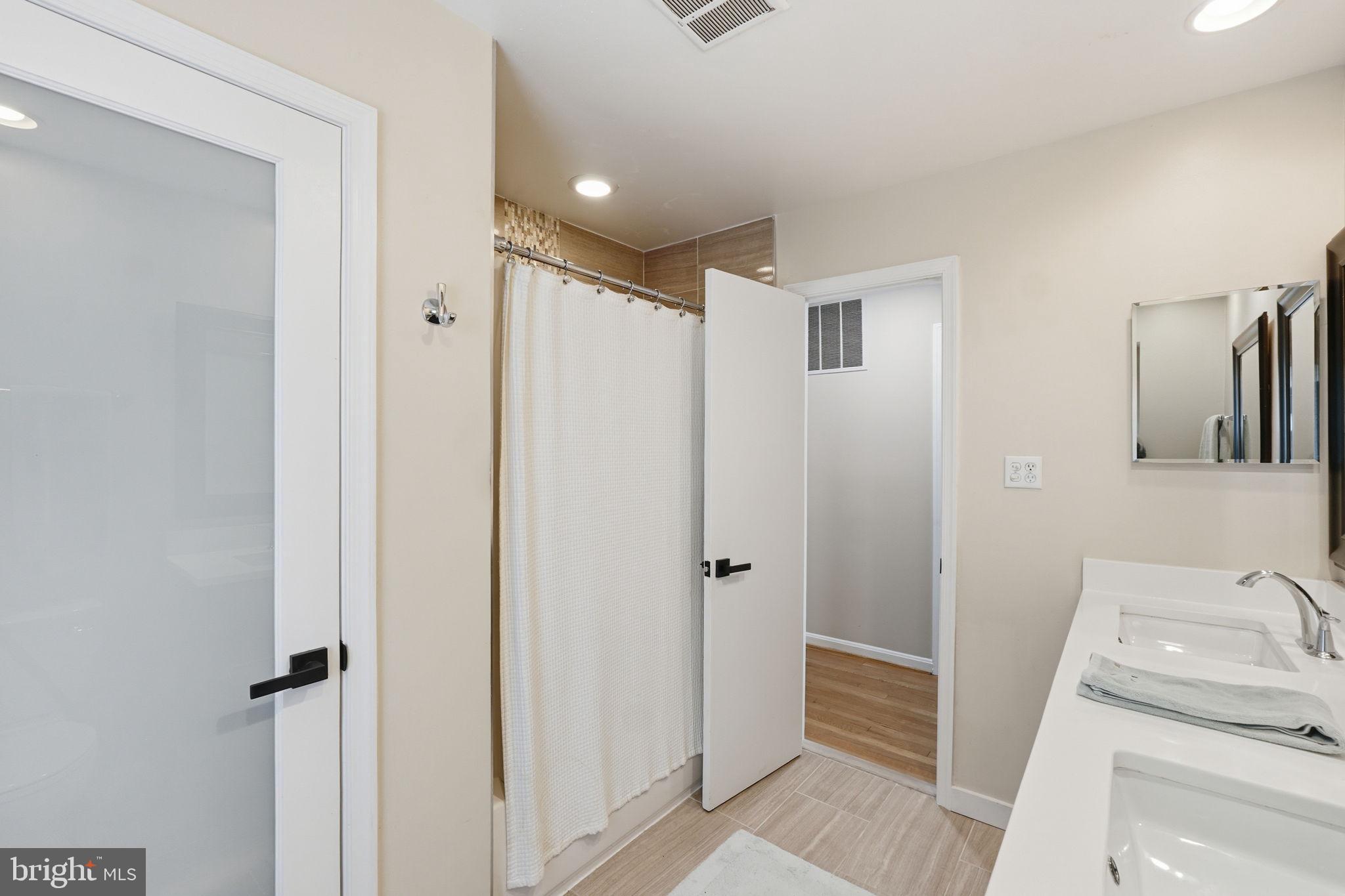 4205 Norbeck Road Rockville, MD 20853 - Photo 25 of 33 Modern bathroom with sleek design.