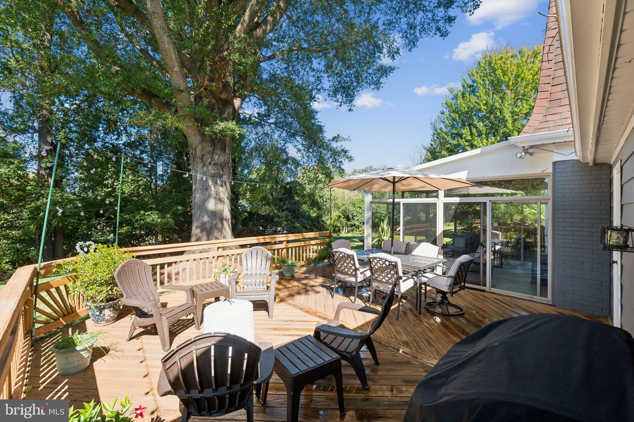 4205 Norbeck Road Rockville, MD 20853 - Photo 29 of 33 Sunny deck retreat surrounded by nature.