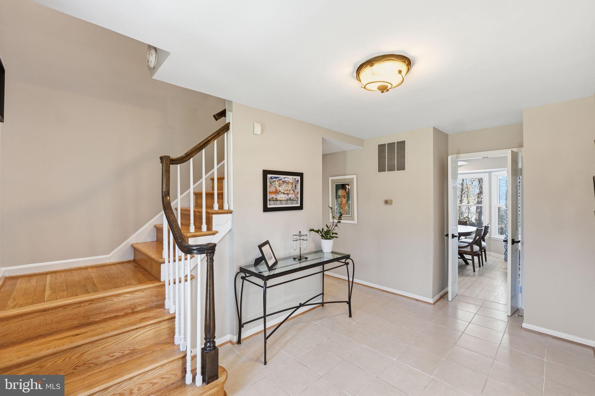 4205 Norbeck Road Rockville, MD 20853 - Photo 3 of 33 Inviting entryway with elegant staircase.