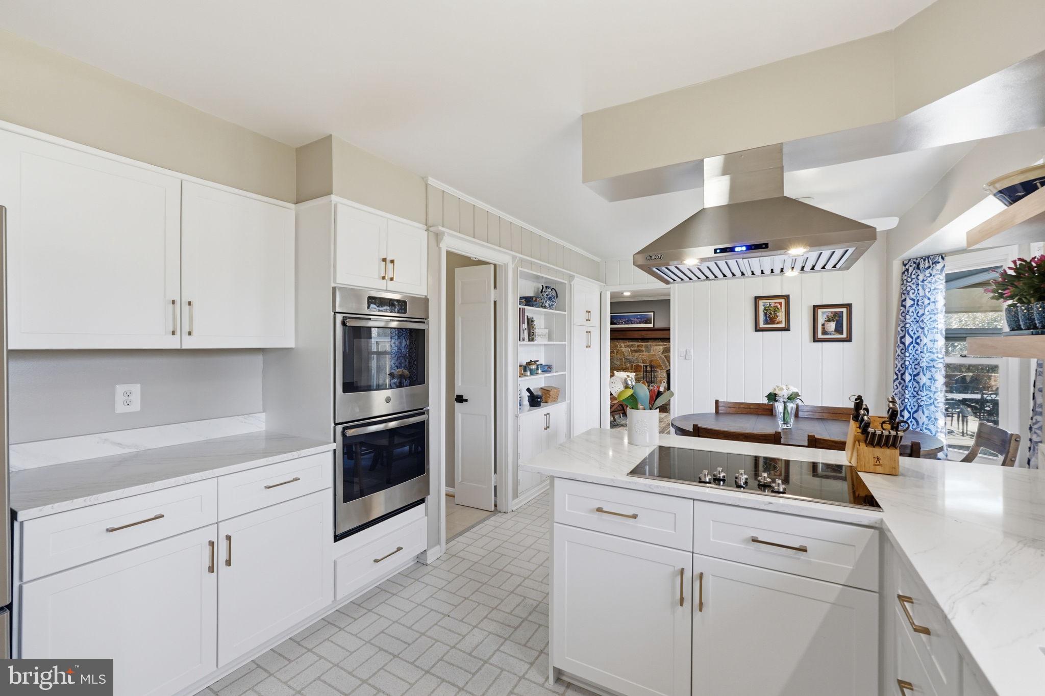 4205 Norbeck Road Rockville, MD 20853 - Photo 8 of 33 Modern elegance in a bright kitchen.