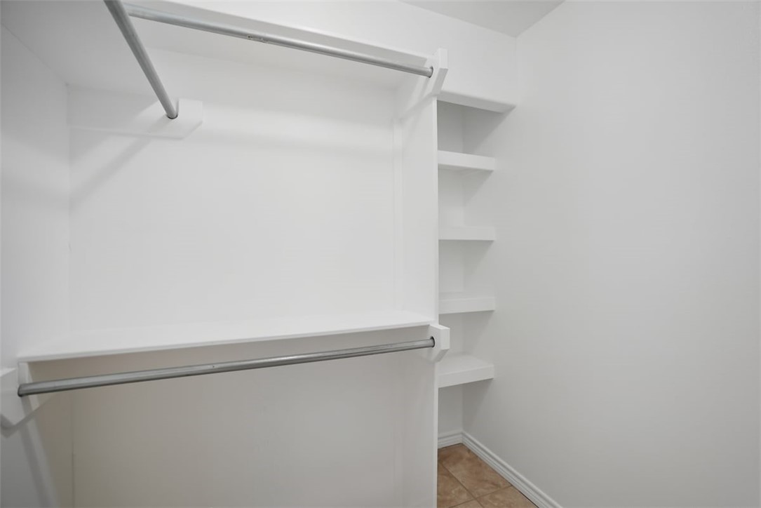 107 South 4th Street Odem, TX 78370 - Photo 19 of 29 a view of an empty walk in closet