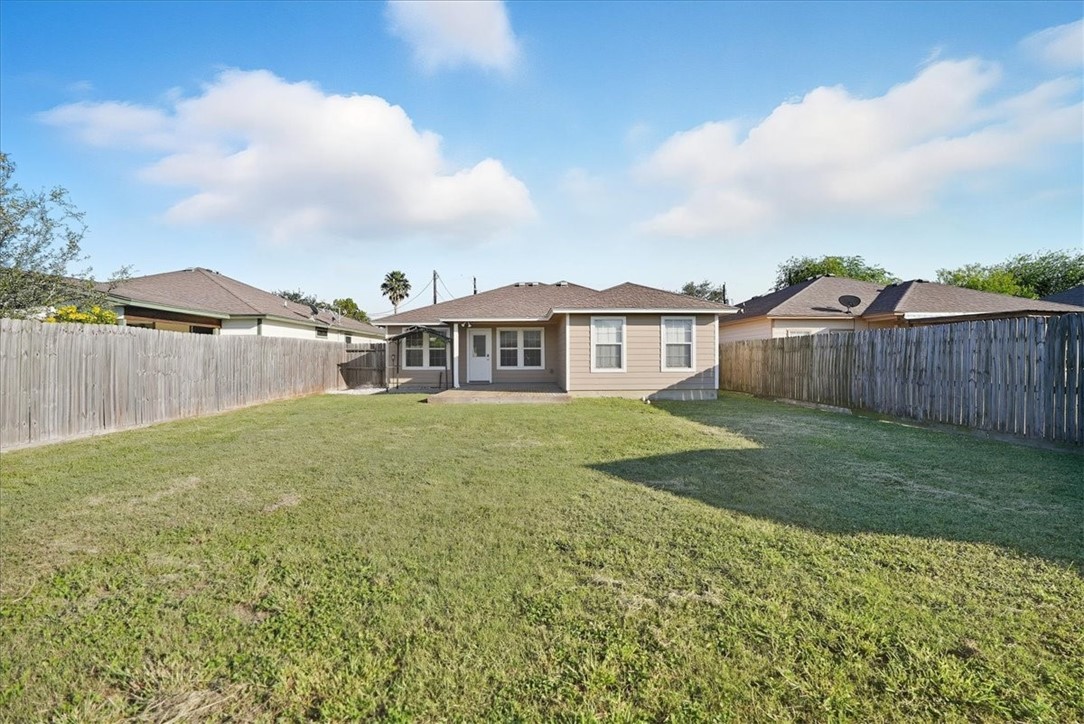 107 South 4th Street Odem, TX 78370 - Photo 27 of 29 a view of a house with a yard and sitting area