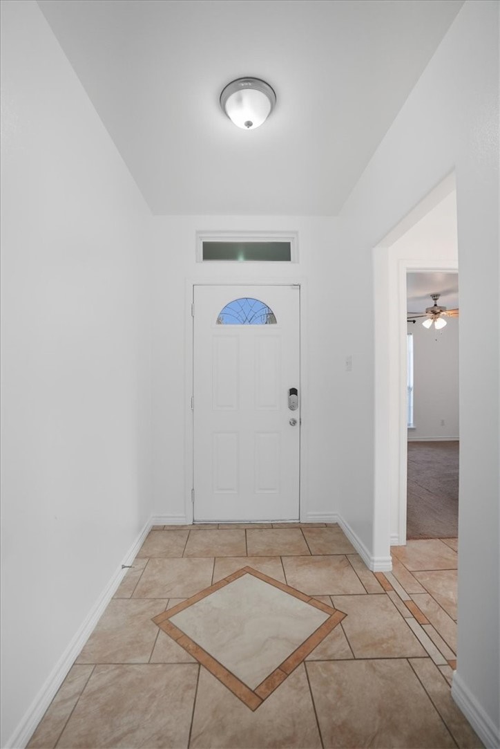 107 South 4th Street Odem, TX 78370 - Photo 5 of 29 an empty room with closet and wooden floor