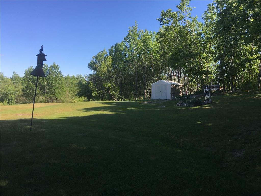 238 Langdon Road Richmond, ME 04357 - Photo 25 of 26 View of backyard and utility shed.