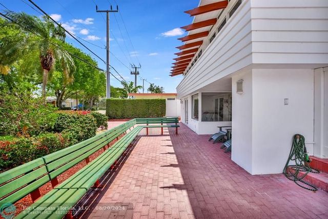 a bench sitting in the middle of a yard
