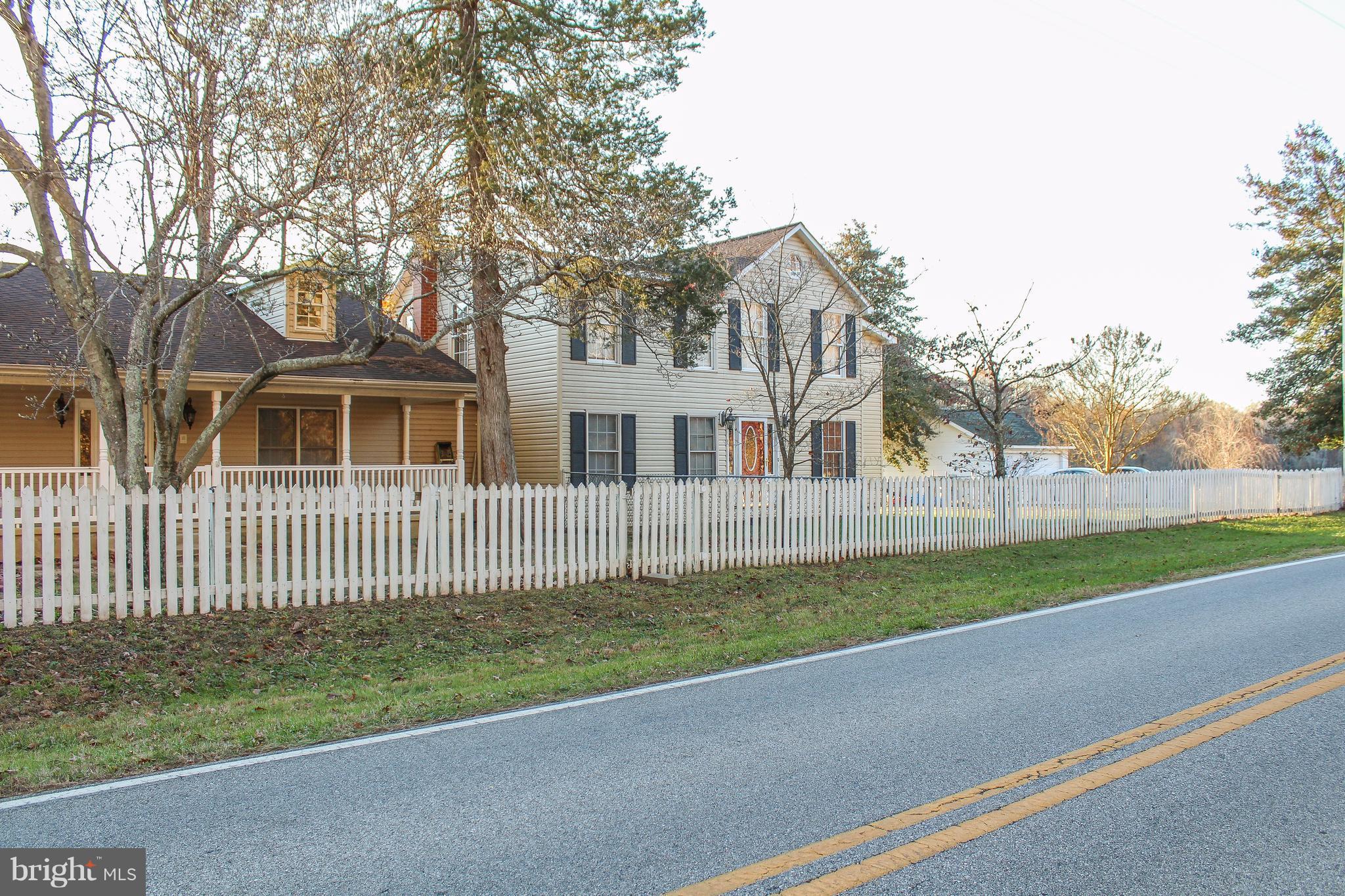 4155 Smallwood Church Road Indian Head, MD 20640 - Photo 2 of 30 a front view of a house with a garden