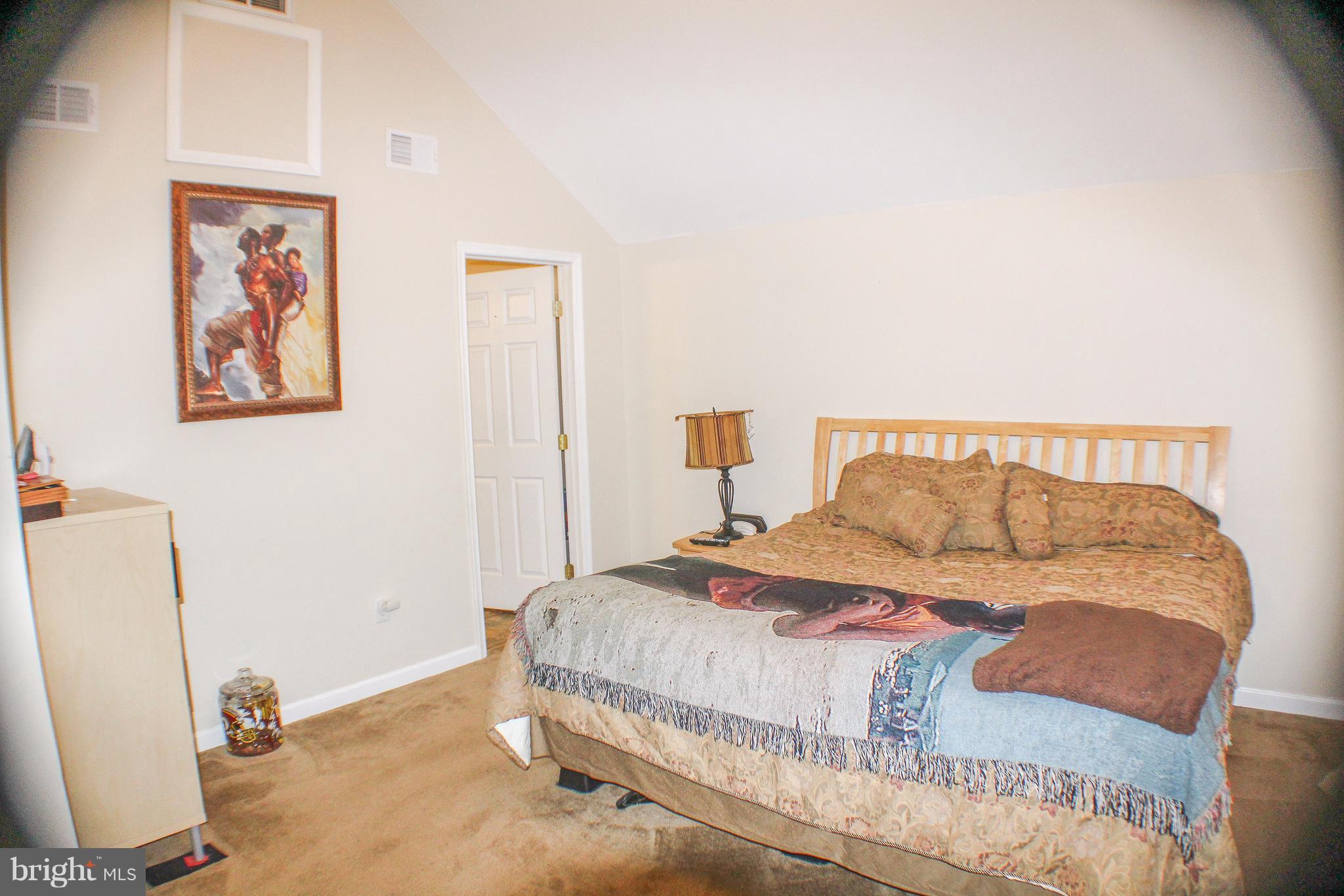 4155 Smallwood Church Road Indian Head, MD 20640 - Photo 15 of 30 a bedroom with a bed and a window