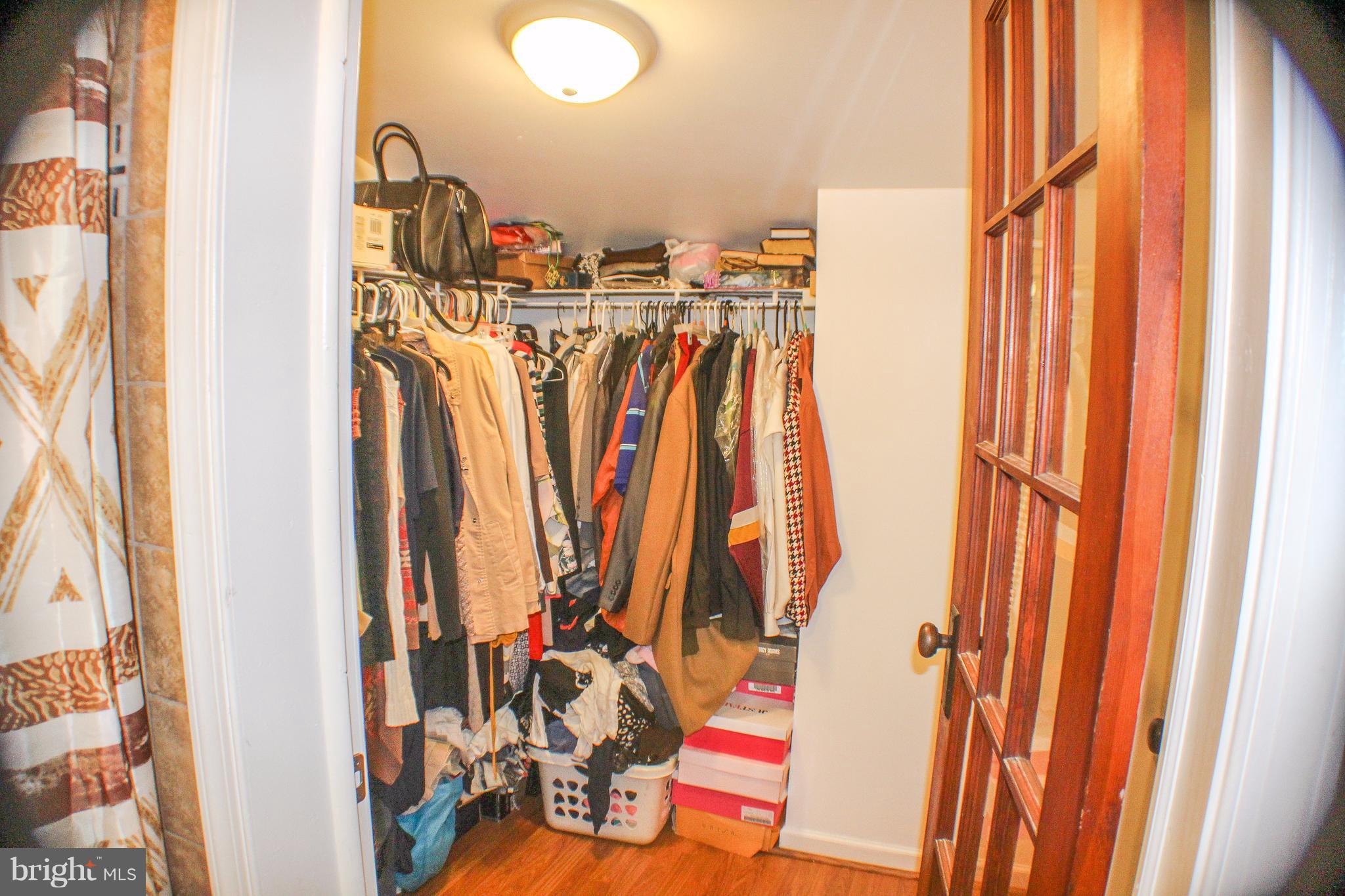 4155 Smallwood Church Road Indian Head, MD 20640 - Photo 17 of 30 a view of walk in closet with clothes