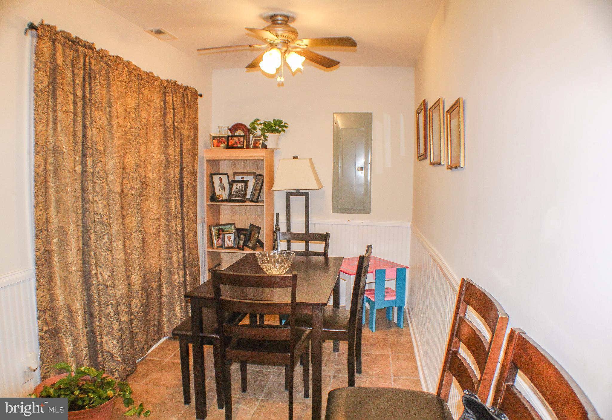 4155 Smallwood Church Road Indian Head, MD 20640 - Photo 8 of 30 a view of a dining room with furniture window and wooden floor