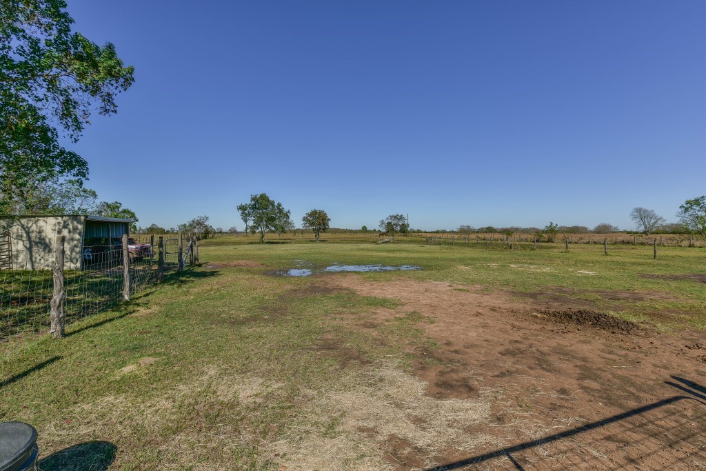 34366 Owens Road Hempstead, TX 77445 - Photo 21 of 46 Open pasture with level, usable land and plenty of space for livestock, recreation, agricultural use, or future improvements in a peaceful country setting.