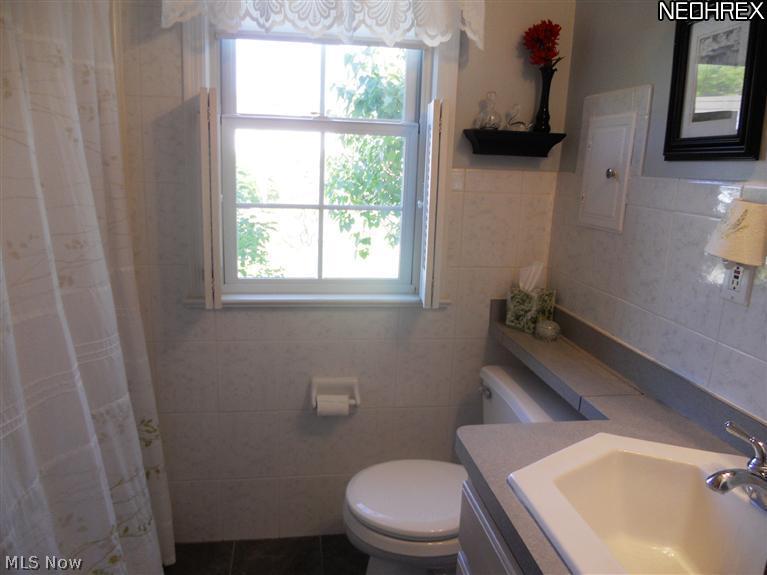 1635 Harwich Road Cleveland, OH 44124 - Photo 7 of 11 Recently Remodeled Full Bath with Ceramic Tile