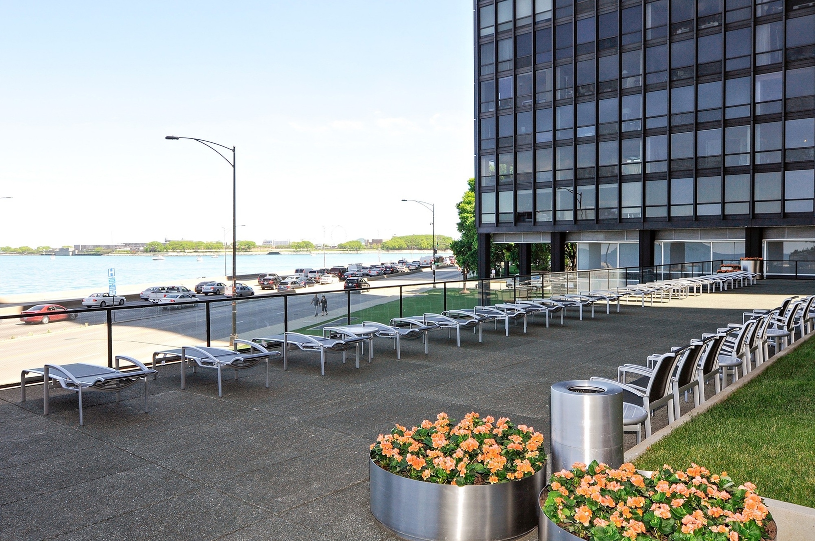 900 North Lake Shore Drive, Unit 1904 Chicago, IL 60611 - Photo 8 of 9 a view of a swimming pool with a patio and a garden