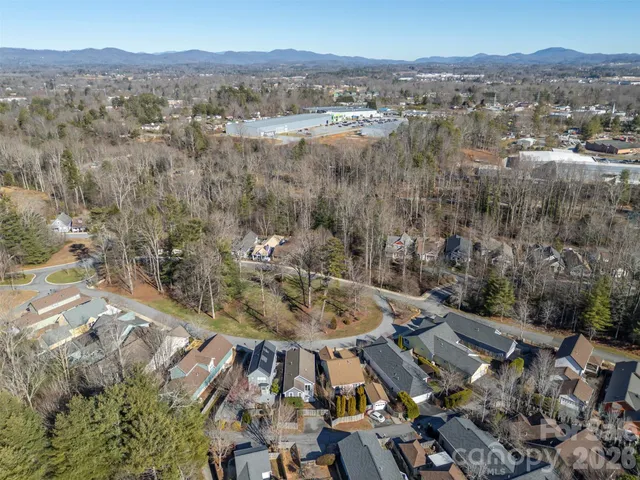an aerial view of a city with lots of residential buildings