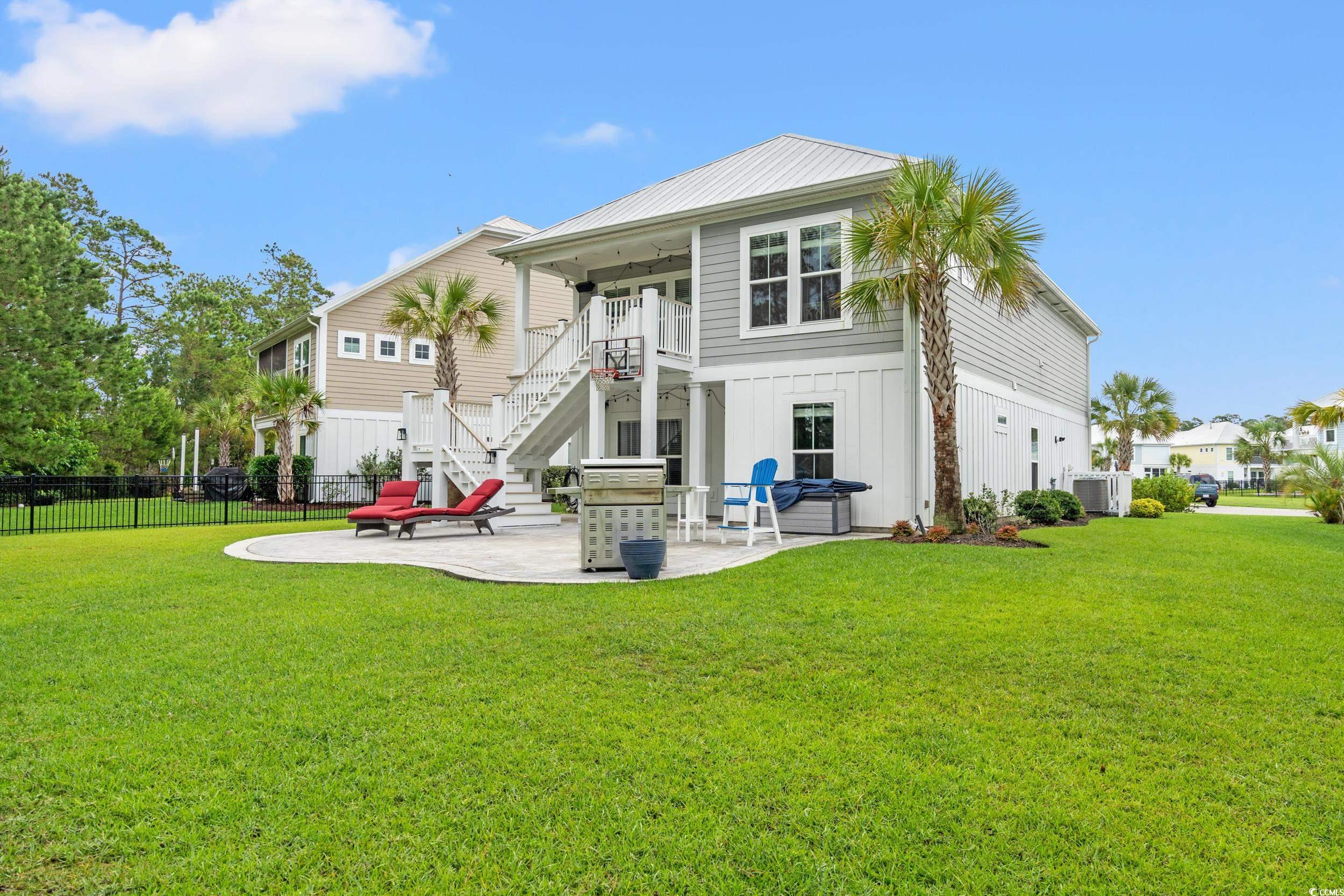 277 Splendor Circle Murrells Inlet, SC 29576 - Photo 23 of 38 Rear view of property featuring a patio, stairway,