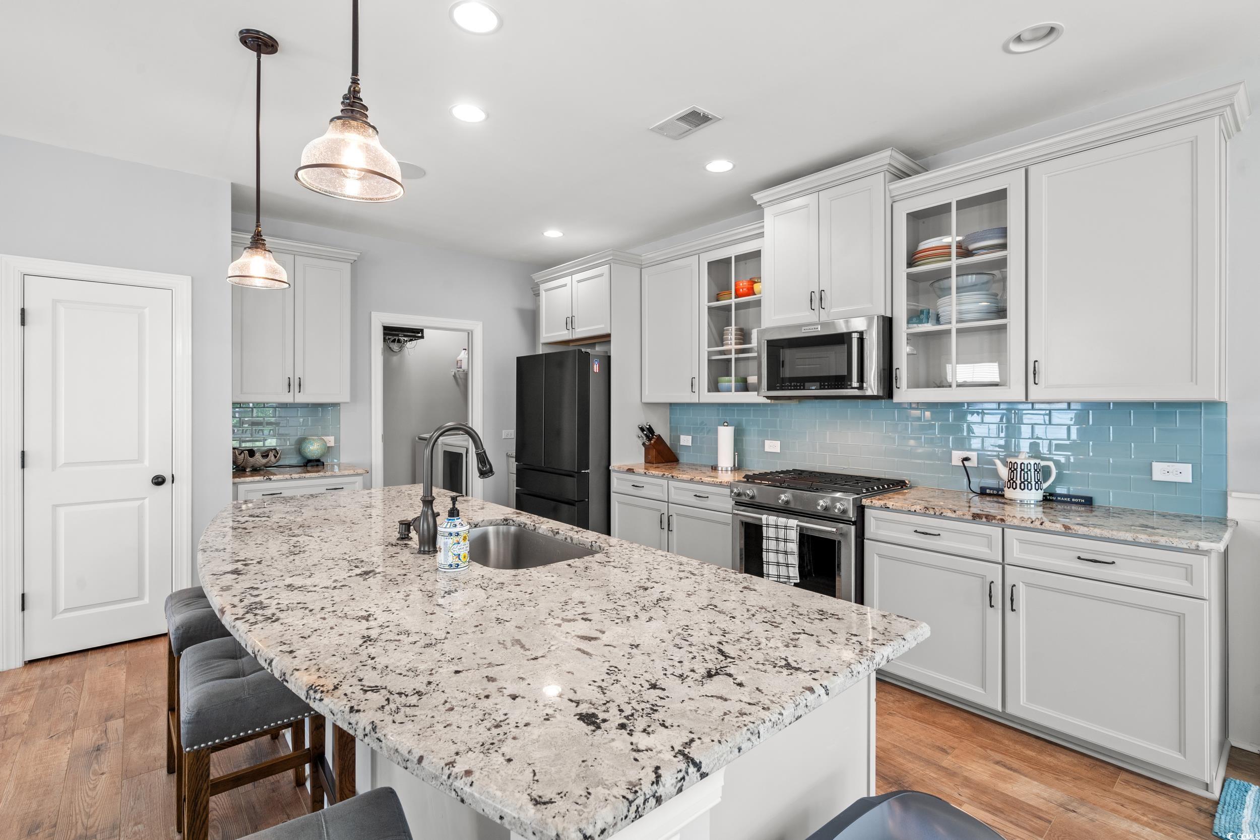 277 Splendor Circle Murrells Inlet, SC 29576 - Photo 9 of 38 Kitchen with appliances with stainless steel finis
