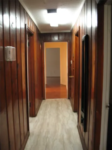 a view of staircase with large mirror