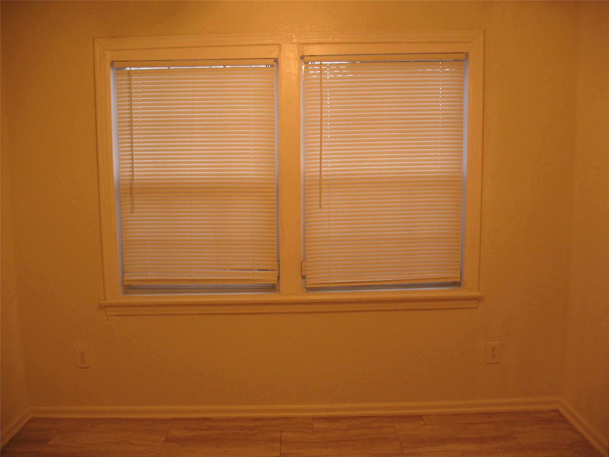 2610 Scott Street Houston, TX 77004 - Photo 5 of 10 a view of a small space with wooden floor and a window