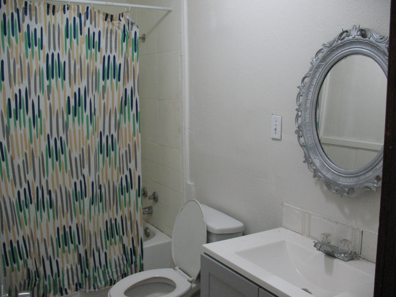 2610 Scott Street Houston, TX 77004 - Photo 10 of 10 a bathroom with a sink and a mirror