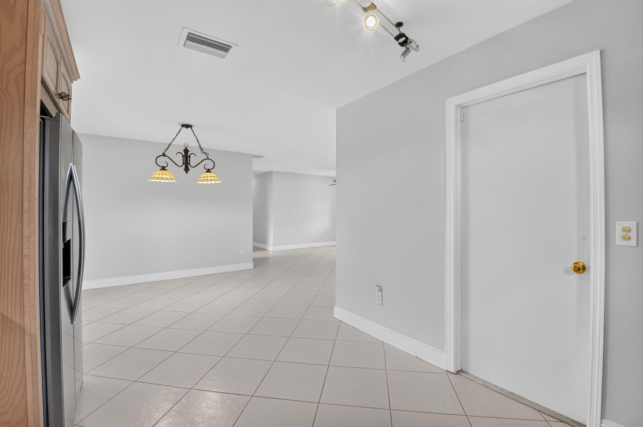 4599 Betelnut Street Boca Raton, FL 33428 - Photo 26 of 28 Garage Entrance