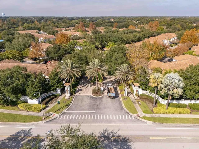 a view of a swimming pool with a yard